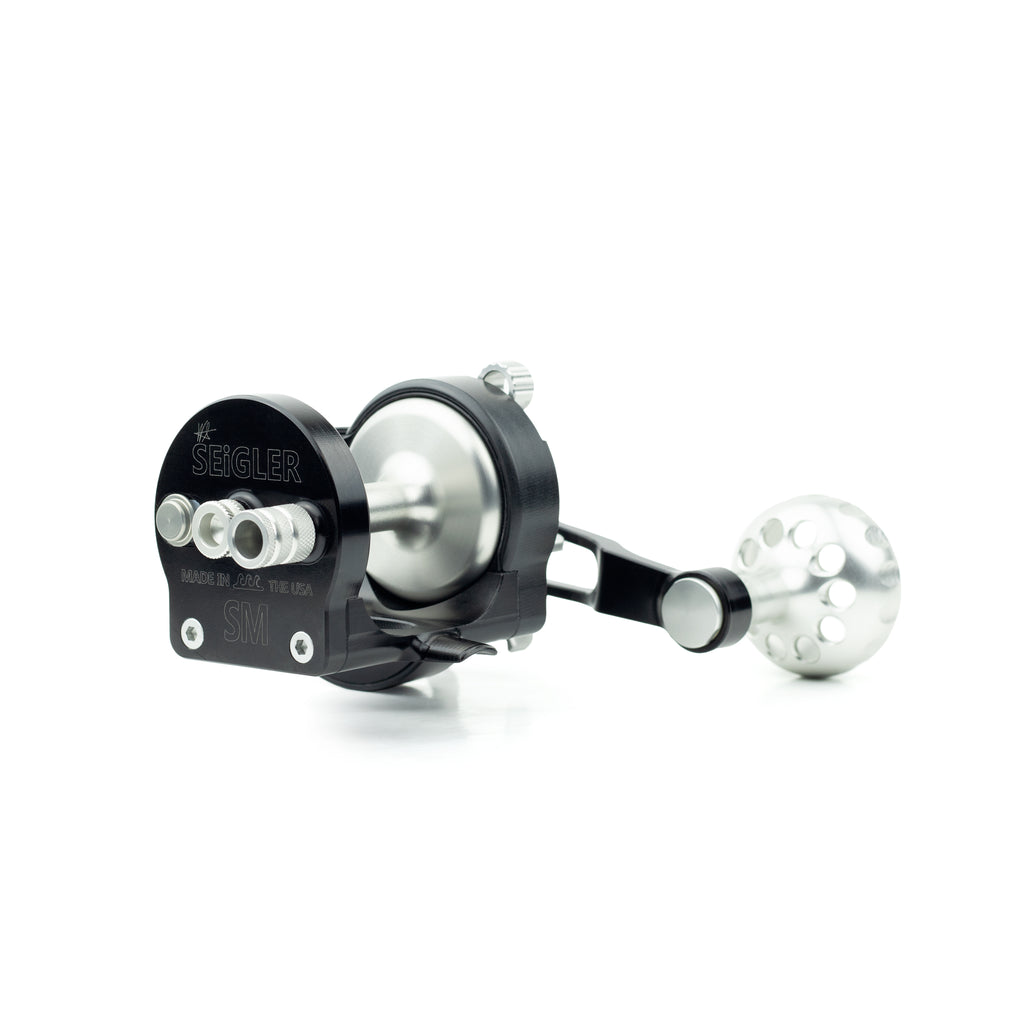 Seigler's Star Mag surf casting reel with magnetic brake and spool tensioner.